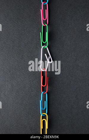 Weakest link in the paper clip chain. Concept of persistence, endurance or resistance Stock Photo