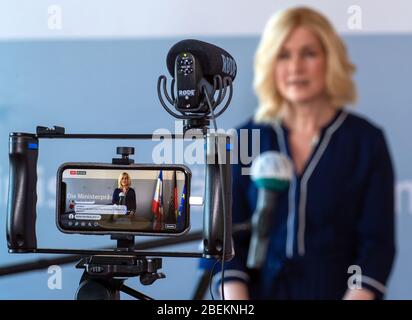 Schwerin, Germany. 14th Apr, 2020. Manuela Schwesig (SPD), the Minister President of Mecklenburg-Western Pomerania, answers questions from media representatives at a press conference following consultations between the state government and medical experts on possible relaxation of contact restrictions in the Corona crisis. The drastic measures to contain the corona epidemic have so far largely been limited until 19.04.2020. Credit: Jens Büttner/dpa-Zentralbild/dpa/Alamy Live News Stock Photo