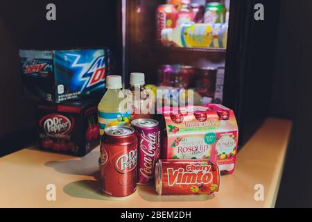 Ufa, Russia, Soda Shop, 3 July, 2019: Grocery store shelf with various brands of soda in cans. Pepsi Co is one of the largest corporations in the non- Stock Photo