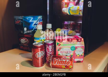 Ufa, Russia, Soda Shop, 3 July, 2019: Grocery store shelf with various brands of soda in cans. Pepsi Co is one of the largest corporations in the non- Stock Photo