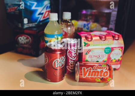 Ufa, Russia, Soda Shop, 3 July, 2019: Grocery store shelf with various brands of soda in cans. Pepsi Co is one of the largest corporations in the non- Stock Photo