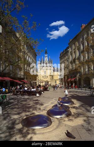 BORDEAUX, FRANCE - 19 January, 2017 : View of historical Porte Cailhau with full of people having lunch on restaurant terrace in Bordeaux, Gironde, Aq Stock Photo