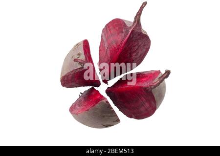 Cut into four pieces red beet isolated on white background, top view Stock Photo