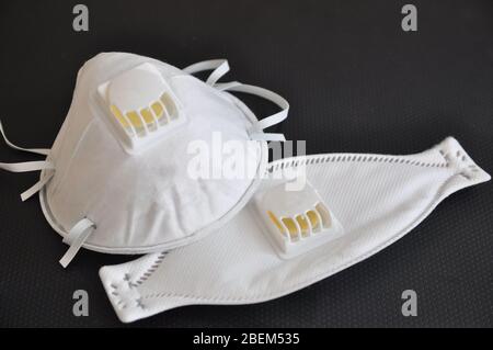 A set of different masks to protect the respiratory system from contamination, including bacterial danger, including coronavirus and influenza virus. Stock Photo