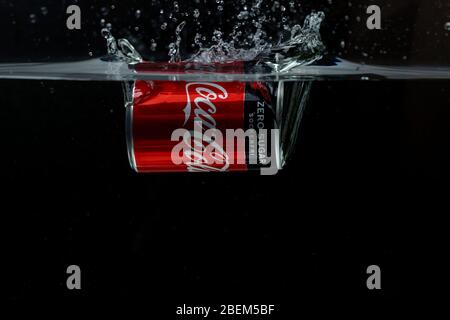Close up view of can falling in water. Coca cola. Sweden. Uppsala Stock Photo