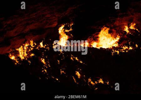Night time photo of the Darvasa Crater, also known as the Doorway to Hell, the flaming gas crater in Darvaza (Darvasa), Turkmenistan Stock Photo