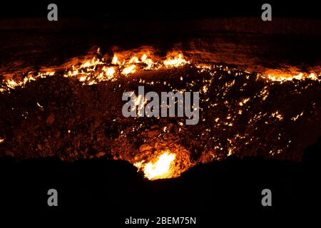 Night time photo of the Darvasa Crater, also known as the Doorway to Hell, the flaming gas crater in Darvaza (Darvasa), Turkmenistan Stock Photo