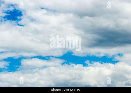 Clouds covering the blue sky, closeup as background Stock Photo