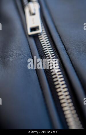Detail of the zip on a leather jacket Stock Photo