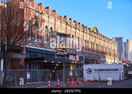 Christchurch, New Zealand - Jun 11, 2017: Earthquake damaged buildings are fenced off Stock Photo