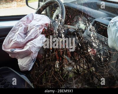 Pink front Airbag Defalted after Car Accident. Reflection in door glass Stock Photo