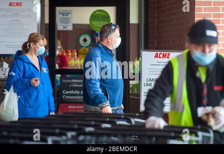 Doylestown, United States. 14th Apr, 2020. Customers exit the store as employees and customers follow safety protocols to help avoid coronavirus Tuesday, April 14, 2020 at ACME Market in Doylestown, Pennsylvania. Credit: William Thomas Cain/Alamy Live News Stock Photo