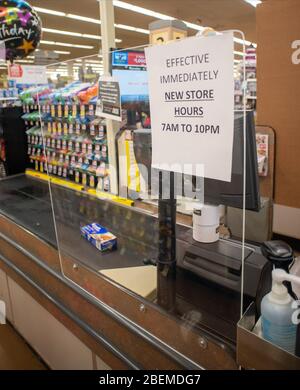 Doylestown, United States. 14th Apr, 2020. Plexiglass wasps inlace to protect the staff it eploeyss employees and customers follow safety protocol to help avoid coronavirus Tuesday, April 14, 2020 at ACME Market in Doylestown, Pennsylvania. Credit: William Thomas Cain/Alamy Live News Stock Photo
