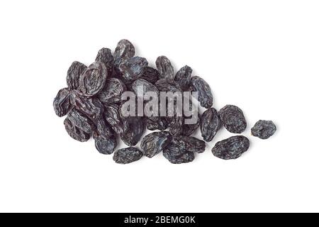 Heap of black raisins on white Stock Photo