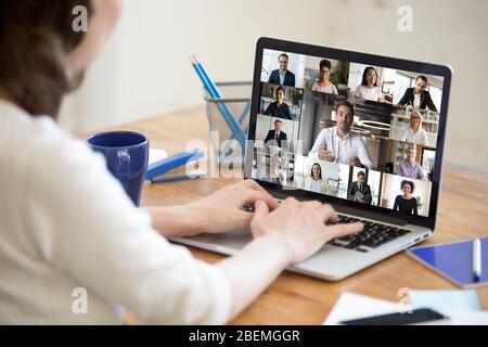 Laptop screen view diverse businesspeople involved at group videocall Stock Photo