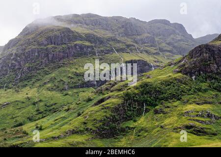 Water pouring off The Three Sisters of Glen Coe after heavy rain  Beinn Fhada (811M), Glen Coe, Highland, Scotland, UK Stock Photo
