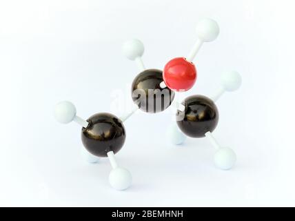 Plastic ball-and-stick model of an isopropyl alcohol (isopropanol) molecule against a white background.