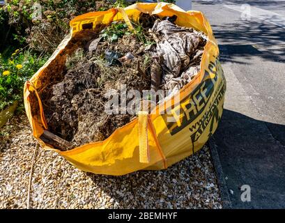 garden skip. Cleaning out the garden  A skip hire  bag ready for collection Stock Photo