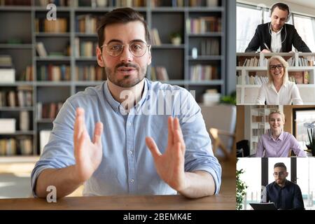 Team leader lead group videoconference meeting with diverse colleagues Stock Photo