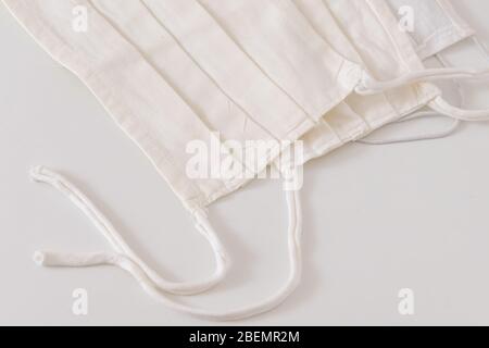 Home made cotton medical masks for protection from virus covid-19 coronavirus Stock Photo