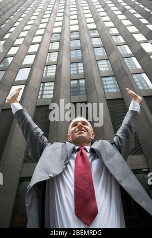 Man standing raising his arms in victory in front of big South Korea ...
