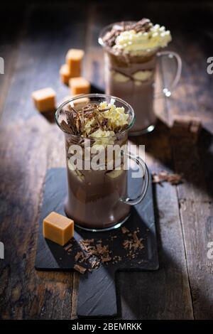 Hot drinking chocolate with whipped cream.Sweet dessert.Healthy food and drink. Stock Photo