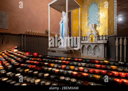 Virgin Mary statue inside the Basilica of our Lady of the Rosary in the Sanctuary of Our Lady of Lourdes, France Stock Photo