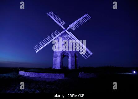 Chesterton, Warwickshire, UK. 14th April 2020. Chesterton Windmill is illuminated blue in support of NHS staff and other key workers during the coronavirus pandemic lockdown. Credit Darren Staples/Alamy Live News. Stock Photo