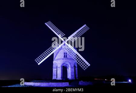 Chesterton, Warwickshire, UK. 14th April 2020. Chesterton Windmill is illuminated blue in support of NHS staff and other key workers during the coronavirus pandemic lockdown. Credit Darren Staples/Alamy Live News. Stock Photo