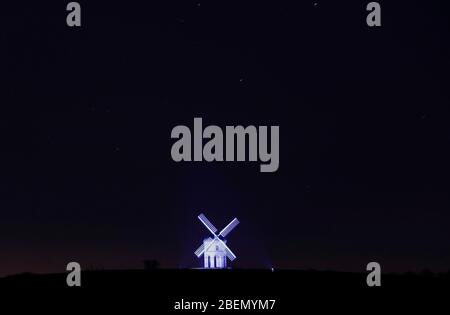 Chesterton, Warwickshire, UK. 14th April 2020. Chesterton Windmill is illuminated blue in support of NHS staff and other key workers during the coronavirus pandemic lockdown. Credit Darren Staples/Alamy Live News. Stock Photo