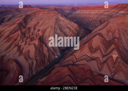 The Raplee Anticline, unique Geology aerial in southern Utah at dusk Stock Photo