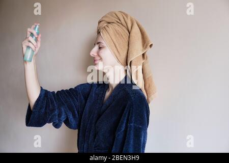 young woman at home takes care of her problem skin with acne Stock Photo
