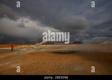 dramatic sky over the geothermal area Namaskard Stock Photo