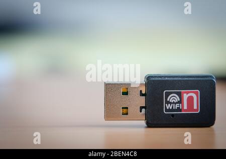 Close-up  of portable   Wireless WiFi N Bluetooth Adapter  used for portable  internet connection  . Stock Photo