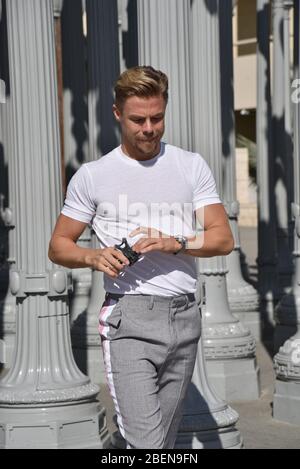LOS ANGELES, CA/USA - OCTOBER 9, 2018: Derek Hough at the Urban Light sculpture at LACMA Stock Photo