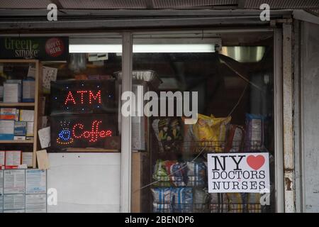 Brooklyn, United States. 14th Apr, 2020. A sign that says NY loves doctors and nurses hangs on a door amid the coronavirus pandemic. As the curve flattens, New York continues to see high daily death tolls, recording once again over 700 coronavirus deaths yesterday. Credit: SOPA Images Limited/Alamy Live News Stock Photo