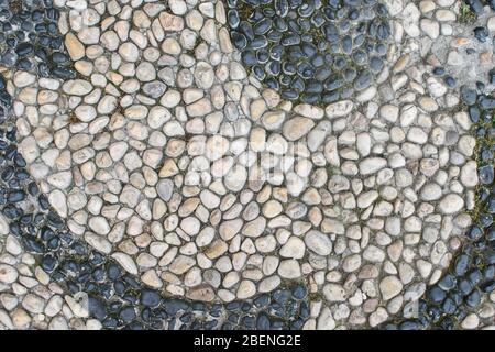 The surface of the many river stones. Great for design and texture background. Abstraction in nature. Stock Photo