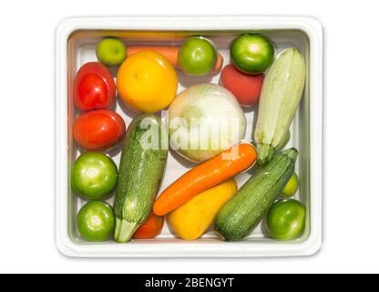 Fruit and vegetables washing in soapy water for coronavirus disinfection isolated. Stock Photo