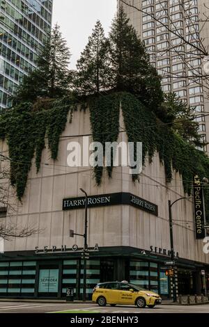 VANCOUVER, CANADA - FEBRUARY 2, 2020: yellow cab taxi car on street downtown. Stock Photo