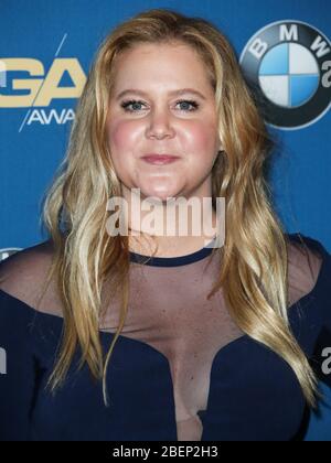 Beverly Hills, United States. 14th Apr, 2020. (FILE) Amy Schumer Donates 2,500 KN95 Masks to New York Hospital Amid Coronavirus COVID-19 Pandemic. BEVERLY HILLS, LOS ANGELES, CALIFORNIA, USA - FEBRUARY 03: Comedian/actress Amy Schumer wearing La Perla with shoes by Jimmy Choo poses in the press room at the 70th Annual Directors Guild Of America Awards held at The Beverly Hilton Hotel on February 3, 2018 in Beverly Hills, Los Angeles, California, United States. (Photo by Xavier Collin/Image Press Agency) Credit: Image Press Agency/Alamy Live News Stock Photo