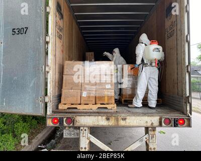 https://l450v.alamy.com/450v/2bep85k/houston-texas-usa-15th-apr-2020-staff-from-the-the-chinese-consulate-general-in-houston-disinfect-the-protective-supplies-in-houston-the-united-states-april-9-2020-the-chinese-consulate-general-in-houston-on-monday-started-to-distribute-health-kits-to-chinese-students-studying-in-the-southern-united-states-as-covid-19-cases-continue-to-grow-in-the-region-according-to-the-consulate-general-about-16000-health-kits-containing-face-masks-and-other-supplies-arrived-in-houston-from-china-a-few-days-ago-the-consulate-general-has-disinfected-and-repacked-the-supplies-credit-xinhuaalamy-2bep85k.jpg