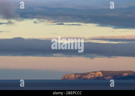 Sunset view of the Poor Knights Islands as seen from Middle Gable, Tutukaka, New Zealand Stock Photo