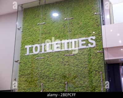 French toilettes text sign with a nature and grass touch