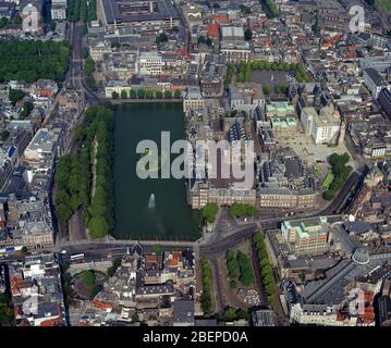 The Hague, Holland, August 08- 1988: Historical aerial photo of the Hofvijver and Binnenhof, Inner Court, a complex of buildings which houses the meet Stock Photo