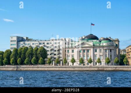 St. Petersburg, Russia, summer 2019: View from the Neva River to Petrovskaya Embankment and the Residence of the representative of the President of th Stock Photo