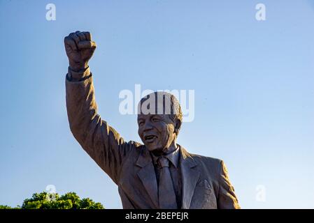 The Long Walk To Freedom Statue outside the Drakenstein Correctional Centre (formerly Victor Verster Prison). It was at these gates where on 11 February 1990, the day of his release, he was met with a jubilant crowd and news agencies from all over the world.  The statue was unveiled in August 2008 in the presence of Mandela on the occasion of his 90th birthday. It is a low-security prison between Paarl and Franschhoek, on the R301 road 5 km from the R45 Huguenot Road, in the valley of the Dwars River in the Western Cape of South Africa. Stock Photo