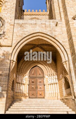 Main Portal with Gothic Apostles of the Cathedral of Évora, Portug Stock Photo