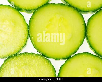 Cucumber slices from above on a white background Stock Photo