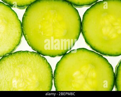 Cucumber slices from above on a white background Stock Photo