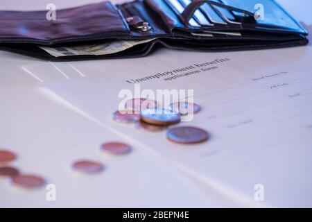 Fill Unemployment benefits form and wallet and money coin Stock Photo